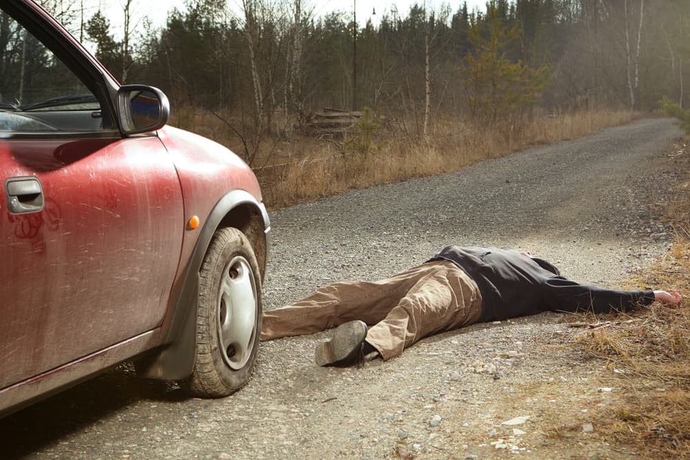 Man on a secondary road struck by a car and left to die alone.